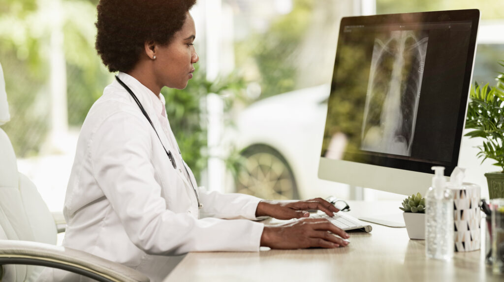 Doctor Working In Her Office
